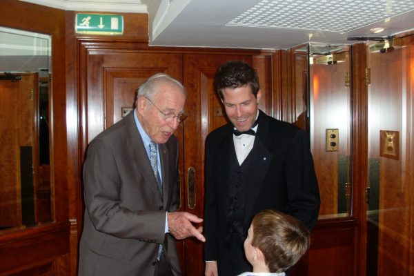 AT 021 Apollo 8 & 13 Astronaut Jim Lovell with Richard's cheeky son James 5, London, 2008