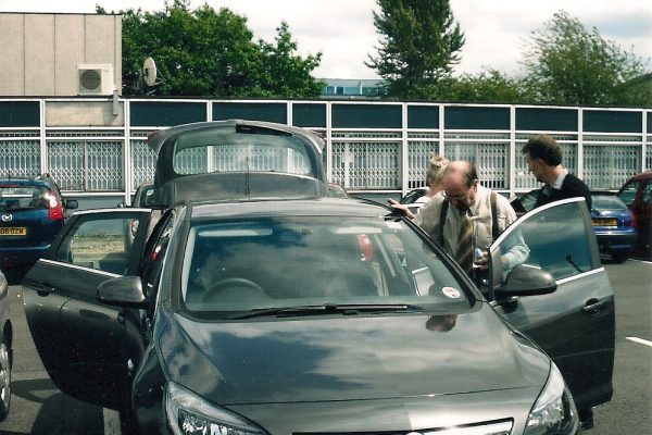 AT 053 Apollo 14 Astronaut Dr. Edgar Mitchell getting into Richard's Hire Car, Pontefract, West Yorkshire, 2010